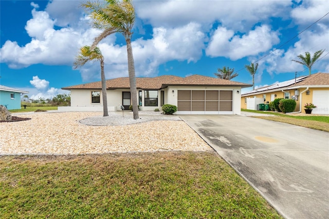 ranch-style home featuring concrete driveway, a front yard, stucco siding, cooling unit, and a garage