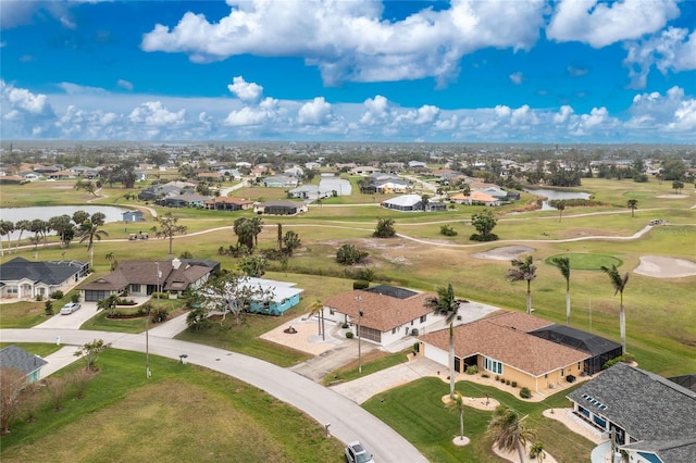 bird's eye view with a residential view and view of golf course