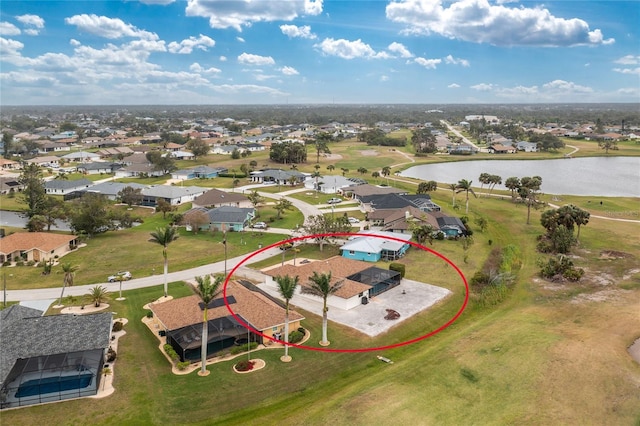 aerial view featuring a residential view and a water view