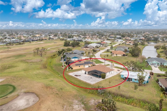 bird's eye view featuring golf course view and a residential view