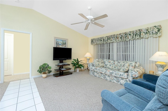 carpeted living room featuring vaulted ceiling, a ceiling fan, and baseboards