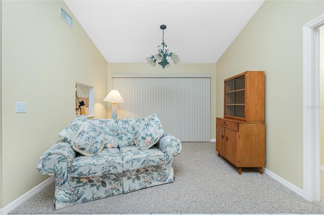 interior space featuring visible vents, light carpet, baseboards, a chandelier, and vaulted ceiling