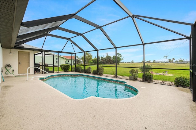 pool featuring a yard, a patio, and glass enclosure