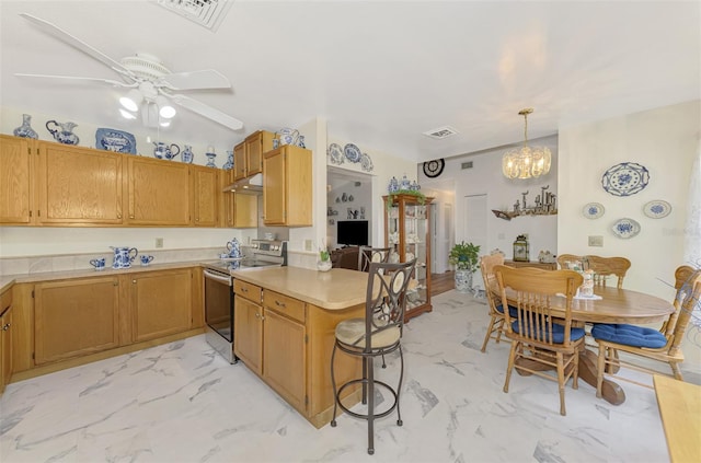 kitchen featuring visible vents, a peninsula, light countertops, electric stove, and marble finish floor