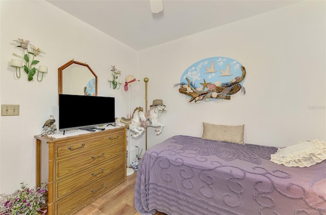 bedroom featuring a ceiling fan and wood finished floors