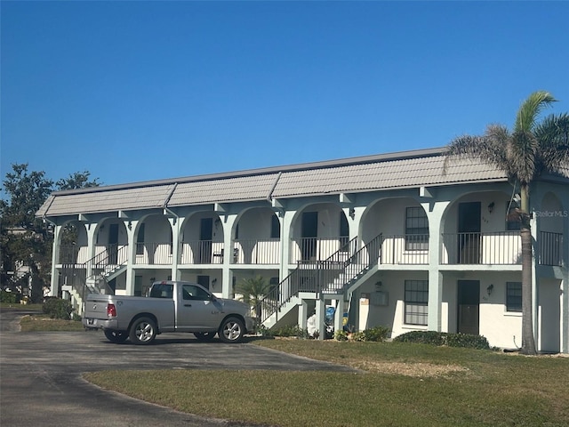 view of building exterior featuring stairs