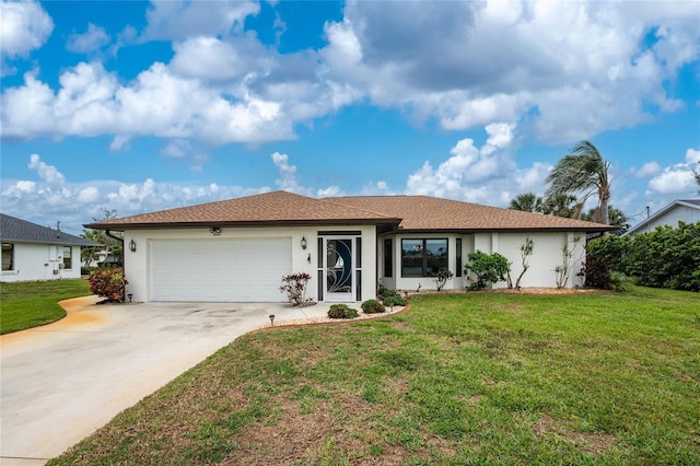 ranch-style house with a front yard, concrete driveway, a garage, and stucco siding