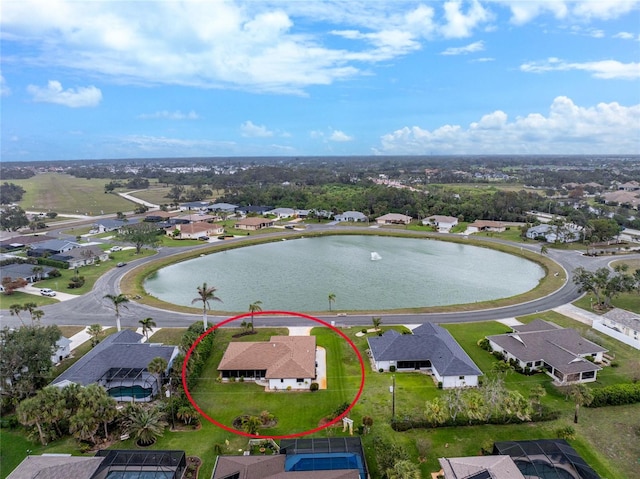 aerial view featuring a residential view and a water view