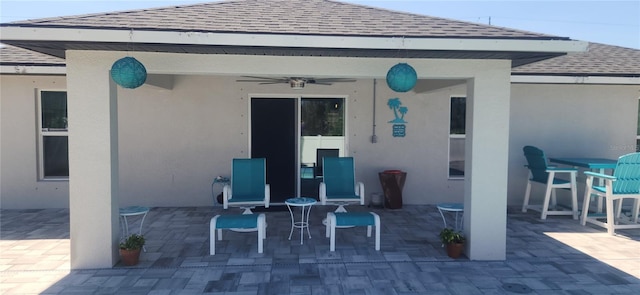 view of patio with ceiling fan