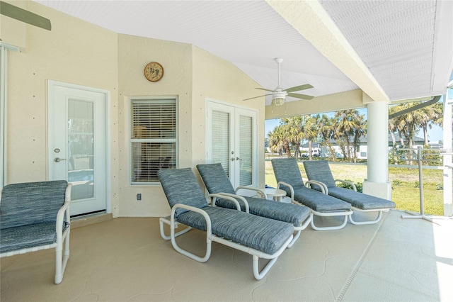 view of patio featuring french doors and ceiling fan