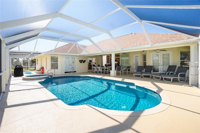 view of pool featuring a lanai, french doors, a patio, outdoor dining space, and a ceiling fan