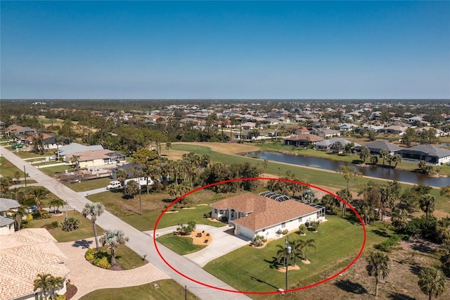 aerial view with a residential view and a water view