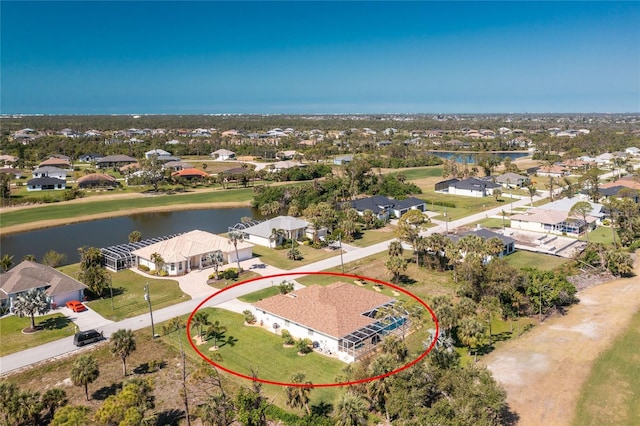 aerial view featuring a residential view and a water view