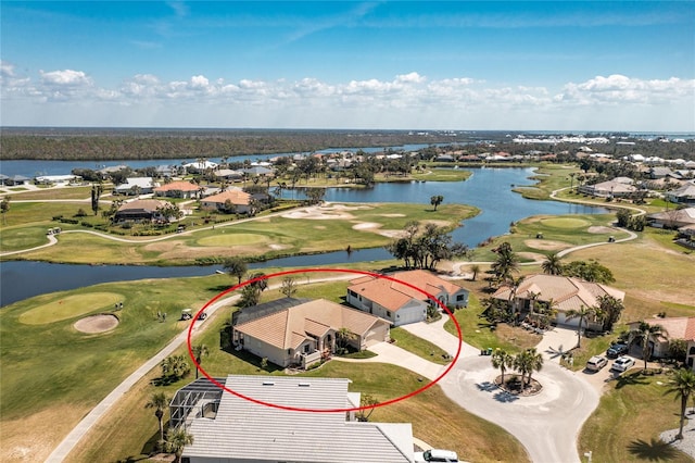 bird's eye view with a residential view, golf course view, and a water view