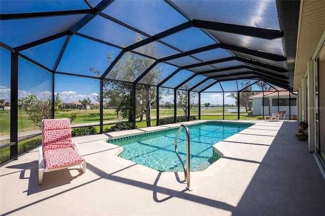 outdoor pool featuring a patio and a lanai