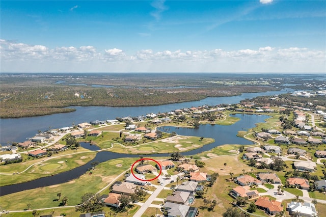 birds eye view of property featuring a residential view, a water view, and golf course view