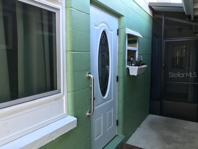 property entrance with a sink