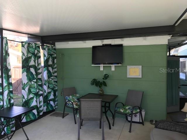 view of patio featuring outdoor dining space