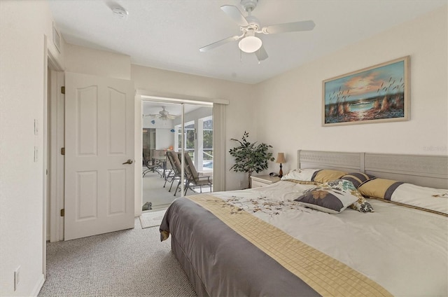 carpeted bedroom with visible vents, ceiling fan, and access to outside