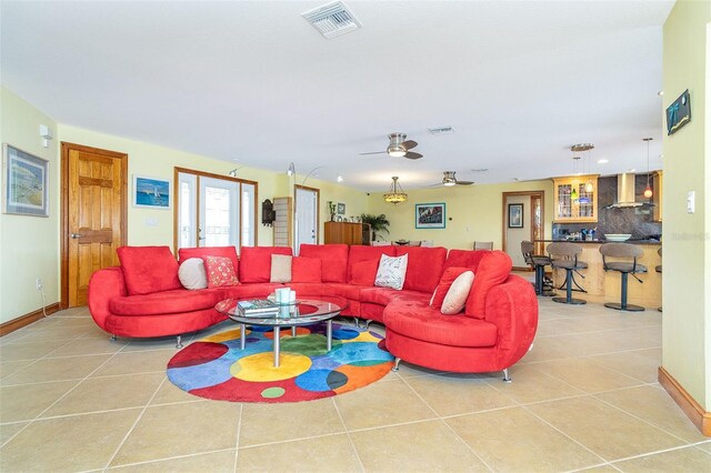 471 Capri Isles Ct, Punta Gorda, FL 33950 - tiled living room with baseboards, a ceiling fan, visible vents, and recessed lighting
