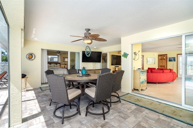471 Capri Isles Ct, Punta Gorda, FL 33950 - view of patio featuring outdoor dining space and ceiling fan