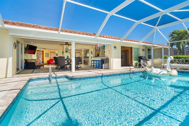 471 Capri Isles Ct, Punta Gorda, FL 33950 - pool featuring a lanai, a grill, and a patio area