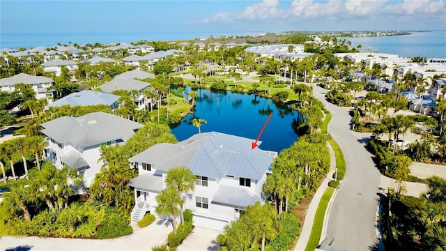 aerial view featuring a residential view and a water view