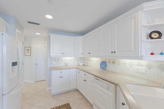 kitchen featuring white appliances, white cabinetry, open shelves, and a sink