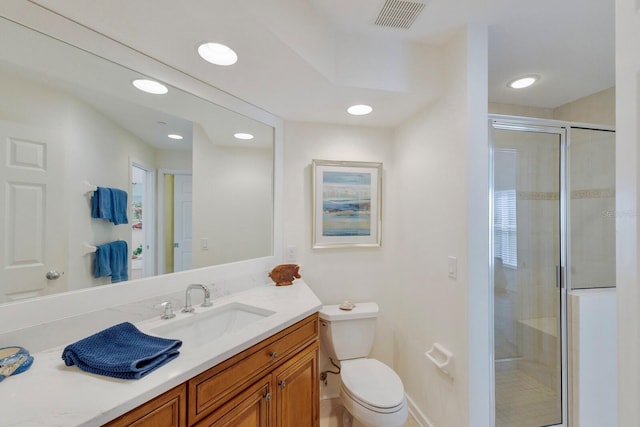 full bath with visible vents, a shower stall, toilet, recessed lighting, and vanity