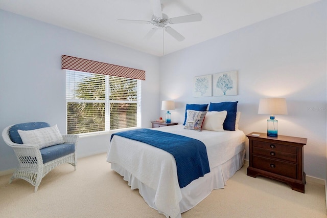 bedroom featuring a ceiling fan, baseboards, and carpet floors