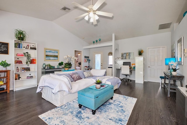 living room with a ceiling fan, lofted ceiling, wood finished floors, and visible vents