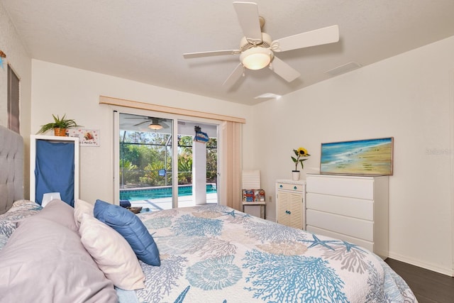 bedroom featuring visible vents, access to outside, wood finished floors, baseboards, and ceiling fan