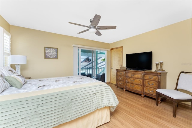 bedroom with a ceiling fan, light wood-style floors, and access to outside