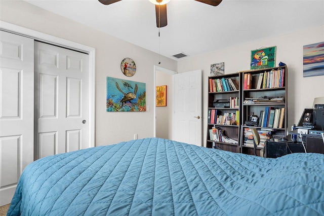 bedroom with visible vents and a ceiling fan