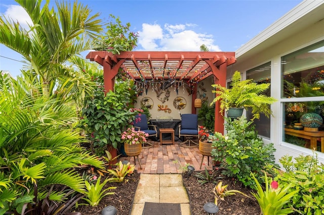 view of patio with outdoor dining area and a pergola