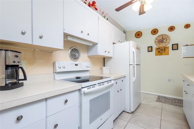 kitchen with white cabinetry, white appliances, light countertops, and tasteful backsplash