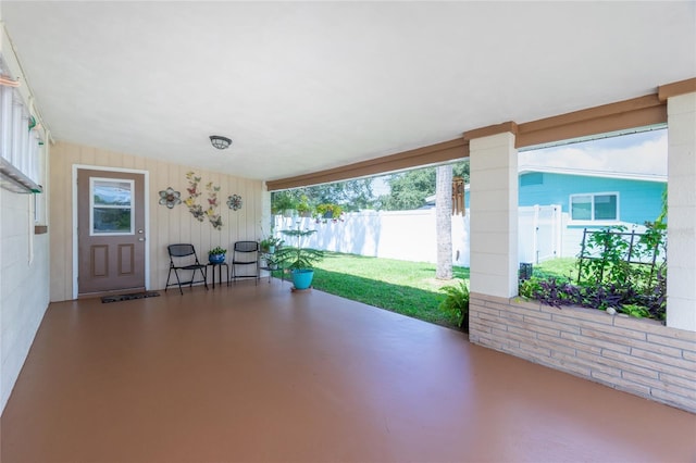 view of patio / terrace featuring fence