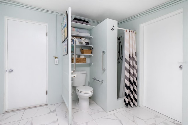 full bath with marble finish floor, toilet, and a shower with shower curtain