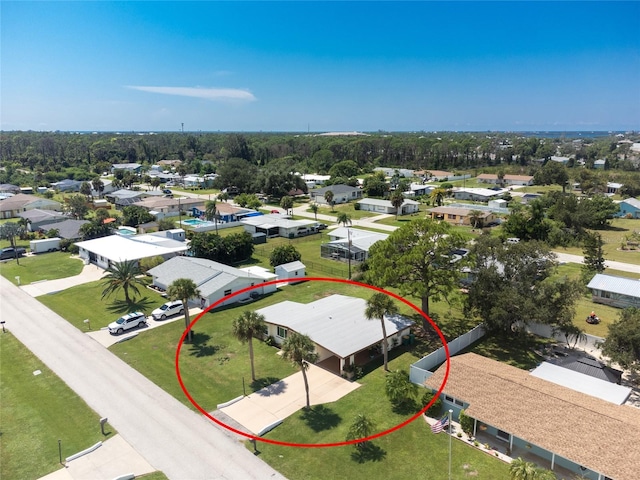 birds eye view of property with a residential view