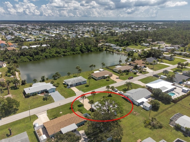 aerial view with a residential view and a water view