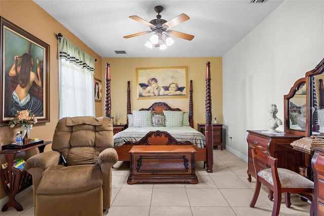 bedroom with light tile patterned floors, visible vents, baseboards, and a ceiling fan