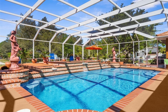 pool with a patio and a lanai