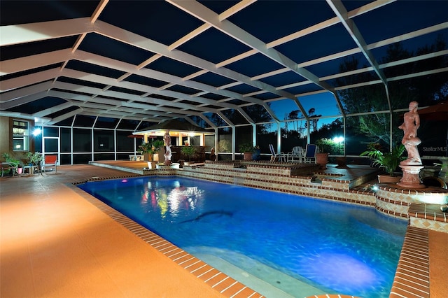 pool featuring a patio area and a lanai