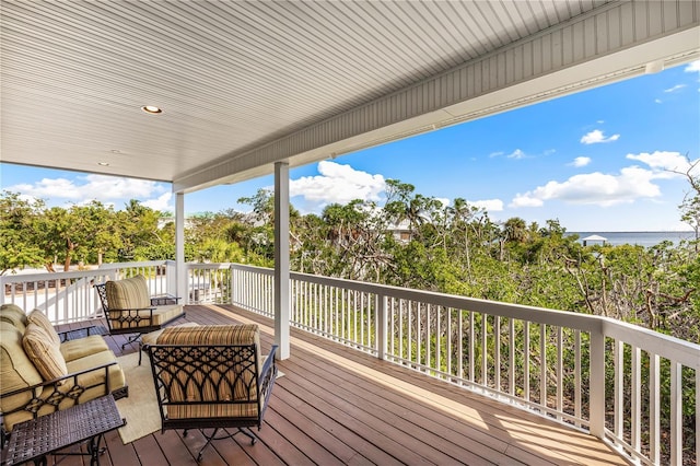 deck featuring outdoor lounge area