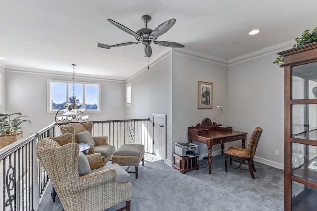 sitting room with visible vents, baseboards, carpet flooring, and crown molding