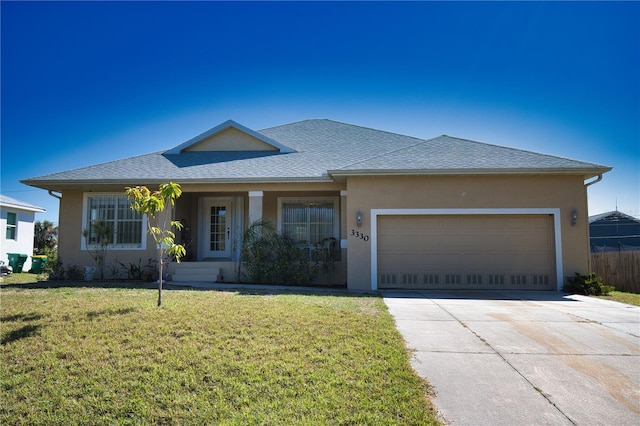 view of front of house with driveway, a shingled roof, stucco siding, a front lawn, and a garage