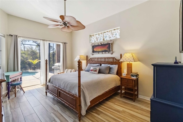 bedroom featuring baseboards, light wood-style floors, access to exterior, and a ceiling fan