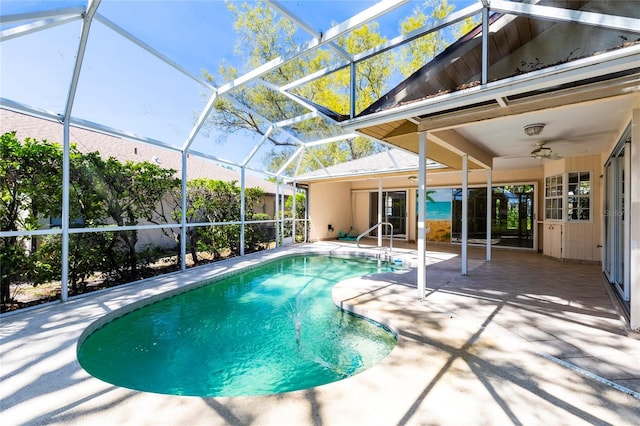 pool featuring ceiling fan, a patio, and a lanai