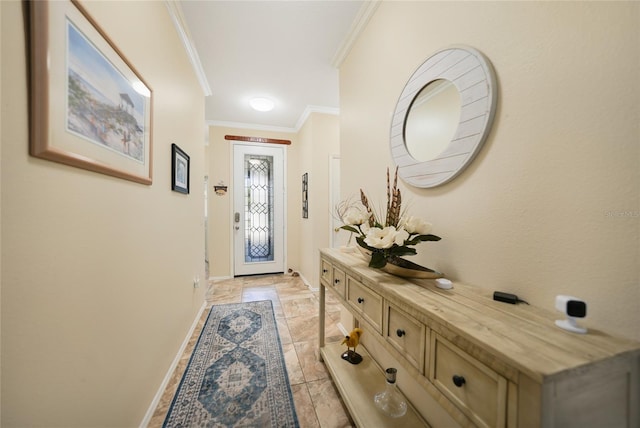 entryway with baseboards and ornamental molding