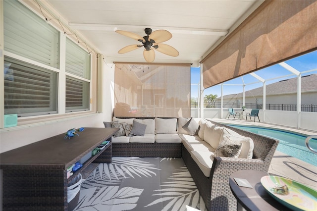 view of patio / terrace featuring glass enclosure, a ceiling fan, fence, a fenced in pool, and an outdoor hangout area